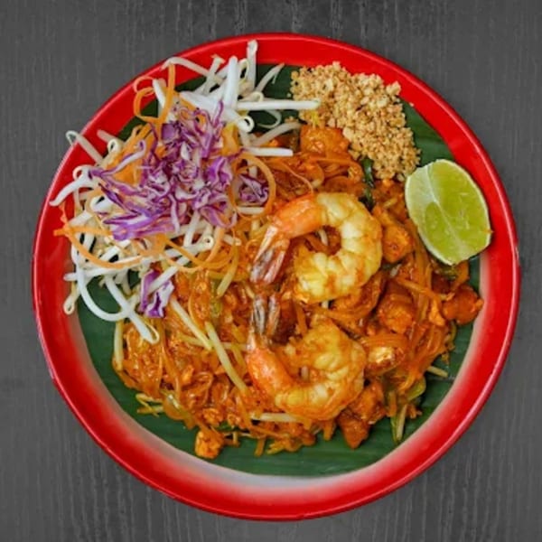 Thai Recipe Cuisine's Pad Thai with shrimp, bean sprouts, shredded cabbage, peanuts, and lime.